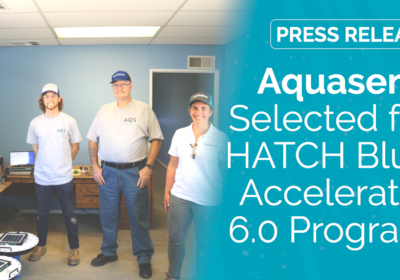 Graphic of Aquasend employees standing around three beacons with "Aquasend Selected for HATCH Blue Accelerator 6.0 Program"